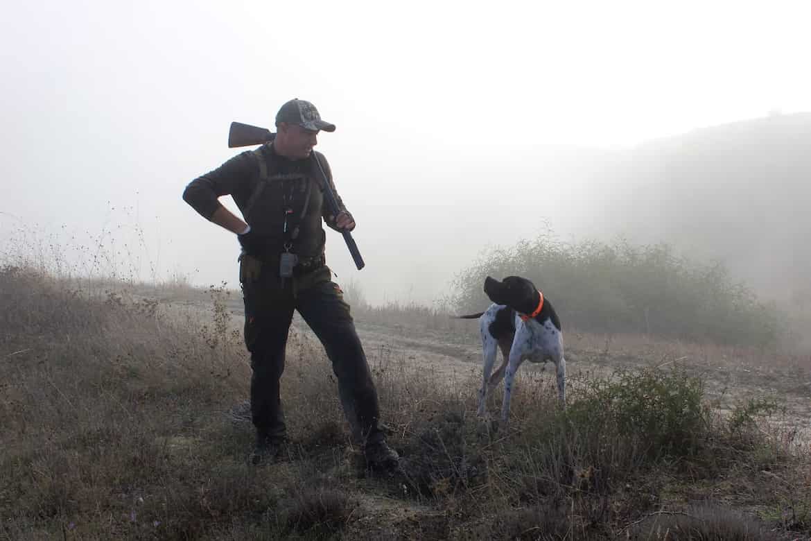 A hunter with his dog